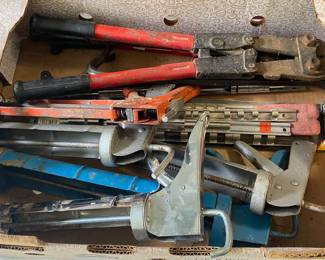 Caulk Guns and Bolt Cutters