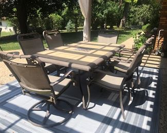 Metal Table, 6 Rocker Chairs