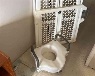 This lot contains a a Scale, Toilet seat Assist for the handicapped, and a collapsible gate. Have been used.