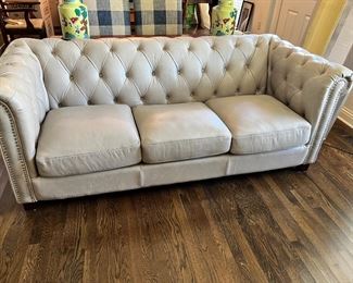 #23) - $650 -Grey Leather Sofa with Down Cushions.  Button Tufted Chesterfield Pattern.  81 x 38 x 31.  18 Inch Seat.  