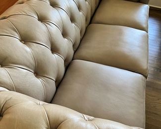 #23) - $650 -Grey Leather Sofa with Down Cushions.  Button Tufted Chesterfield Pattern.  81 x 38 x 31.  18 Inch Seat.  