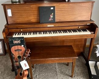 #102) - $500 - Baldwin Upright Piano with Bench.  Clean and In good working order.  