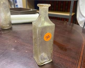 DRYDEN & CAUGHRAN GLASS BOTTLE