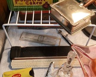 Hand ash tray
Table sweeper
Slide rule