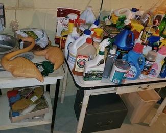 Lawn Flamingos, cleaning supplies, metal table