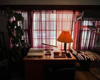 Artificial houseplant, solid oak desk, typewriter