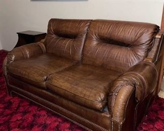 Kroehler vintage leather loveseat with hand made cover matches lots 1000 and 1001