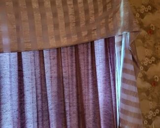 Pleated drapery with long draping valance see pictures