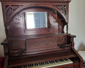 A very ornate Victorian Organ is waiting to grace your home or business...