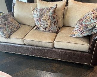 Massoud leather and fabric couch purchased at Swanns October 2022 but never used.  Also fabric  matching chairs and dining room chairs.