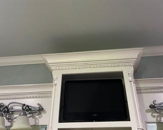 Several flatscreens in assorted sizes