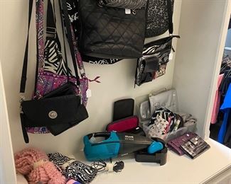 Purses, socks, women’s clothes and men’s clothes and shoes