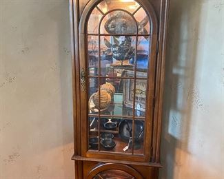 Lighted curio cabinet with beach decor