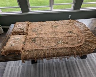 28.)  ca 1890's Figural Bed Boudoir Cover and 2 Lace Boudoir Pillows with velvet trim.  Extensive silk Ribbon work.  Italian nude, Filet, Tambour, handmade Brussels lace, and embroidery.  Silk Satin Lining.  A few dime size tears in flounce and 1 half dollar size tear in flounce.  Aside from mentioned, Excellent Condition.  Very Beautiful piece.  $  1350.00