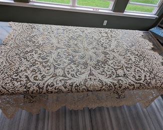 5b.)  ca 1900 Flemish Bobbin Lace Bedspread.  Gold Hew.   Linen tape lace - Belgian.  Probably handmade.  3 dimensional circular medallions.  Heavily scalloped.  Some age discoloration.   1st of 2.  A matching bedspread is available.   96" x 90".   1 of 2  $685.00 for 1 or  $1250.00 for both.  (see next picture for 2nd bedspread. . 