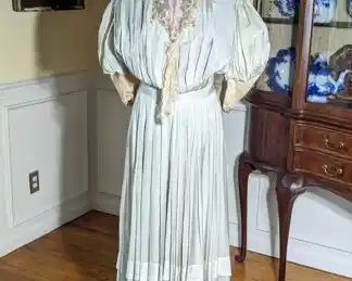 19)  ca 1897 Green dress with applied flowers - possibly a bridal/wedding dress.  There is a note with it mentioning a wedding and the year 1897.   It is unclear if it was a wedding dress or possibly part of trousseau.  Dress is in excellent condition but the inner lining is shattered.   $385.00
