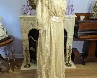 39)  ca 1900's Ecru Embroidered Tambour Lace Wedding Gown.  Larger size.  Pigeon Breast.  Interior silk of bodice shattering.  Lace is great condition,  Skirt lace has a few stains and 1 tear.    Measures:  Shoulder to Shoulder - 14",  Bust - 34",  Waist- 29",  Length 59".  $495.00