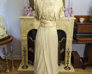 36)  ca 1900's Chiffon Evening/Wedding Dress with Lace and Embroidery.  A couple of areas of damage to netting on front.  Small stain on skirt.  Beautiful lace and embroidery.  Overall condition is very good.    Measures:  Shoulder to Shoulder - 14 ",  Bust - 33",  Waist - 27",  Length 57".     $425.00