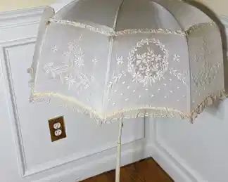 5.)  Rare Silk and Embroidery on net Parasol/Walking Umbrella.  Unusual shape.  Silks is in wonderful condition except for a few stains.  Spokes are brass.  $235.00