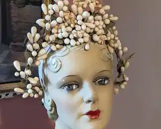 4)  ca 1920's Floral Wax Bridal Wedding  Headpiece.  Headpiece is a wrapped wire frame with wax orange blossom buds, some open orange blossoms, and leaves.  Condition is excellent.  $198.00