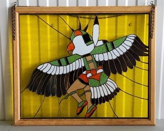 Large leaded glass window with thunderbird.
