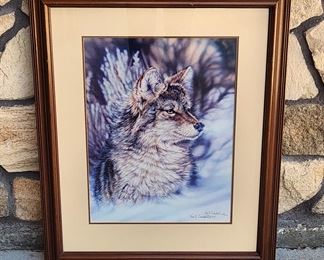 Signed, limited edition print of a wolf in snow, #149/670, entitled "Belly Deep And Blowin'" by Casper Wyoming artist Vivi Crandall. 19 1/2" x 14 1/2" in a 29" x 24" frame. 