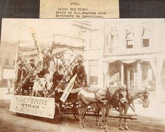 Great photo of the Cheyenne Steam Laundry float in the 1901 Cheyenne, Wyoming Labor Day parade. Photo says "Built by H.A. England with machinery in operation". H. A. England and Sam Finch are identified in the photo. Photo taken by W. G. Walker of Cheyenne. Image is 6" x 8" in a 9 3/4" x 12 3/4" frame.