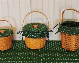 Many vintage Longaberger baskets.