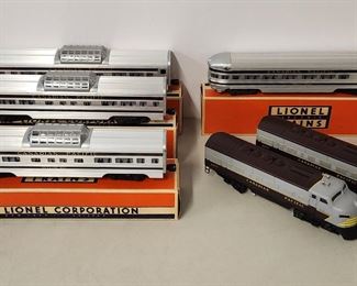 RARE 1957 LIONEL Canadian Pacific 2296W Train Set. If you are a serious collector of Lionel trains, do not miss this opportunity to acquire one of the most desirable and very hard to find Lionel postwar passenger sets. The set was only made for one year, 1957.  It is in excellent condition, with very few signs of use.
The set includes:
1) Dual Canadian Pacific diesel locomotives 2373P (powered) and 2373T (unpowered). No boxes for the engines.
2) Three 2552 Illuminated Vista Skyline 500 dome cars with boxes
3) One 2551 Illuminated Banff Park Observation car
We are happy to answer any questions or provide additional photographs upon request.
