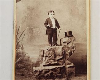 Mid 1800's carte de visite picturing Major Atom, midget performer in the P. T. Barnum circus. CDV measures 2 1/2" x 4". Photo taken by Charles Eisenmann, 229 Bowery, New York City. His name was Samuel Kahn, and he was the nephew of another midget performer, Leopold Kahn, known professionally as Admiral Dot. Lot 292 of this auction is a CDV of Admiral Dot.