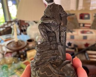 Coal Miner sculpture made from coal