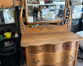 ANTIQUE CARVED OAK DRESSER WITH ATTACHED SWING MIRROR