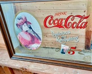 Mirrored Coca-Cola Sign