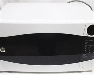 134 - GE Microwave, 16" x 22" x 12.5"
