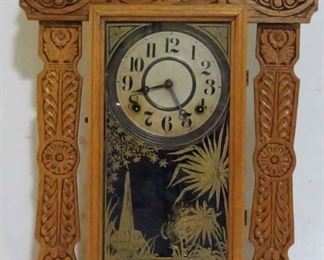 253 - Vintage Ingraham carved oak kitchen clock 15 x 22.5 x 5 with key & pendulum
