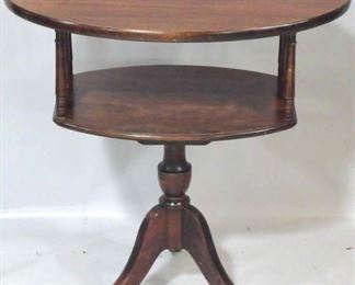 501 - Oval mahogany 2 tier end table 24 x 24 x 16
