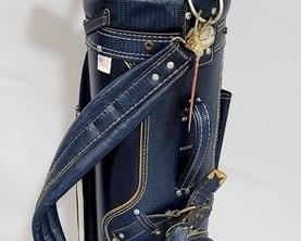 2395 - Golf club bag with golf clubs
