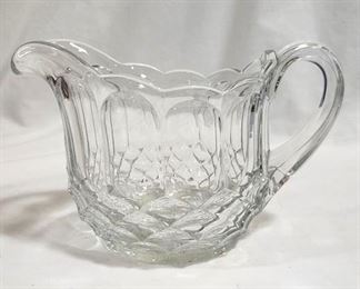 3004 - Early Am Pressed Glass Squat Pitcher, Smith Glass 5.5 tall x 8" wide from handle to spout and the diameter is 4.75
