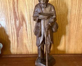 Hand, carved figure, some damage on hat