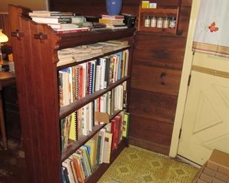 Super Bookcase, it is signed, we can not make out the name