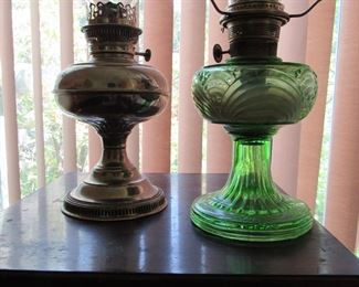 Two of many oil lamps and parts