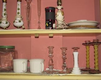 Many Many Candle Sticks and lamps throughout home.