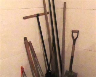Nice old iron post hole BARS and digger to name a few