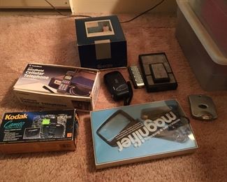 Early cellphone, Poloroids, kodaks