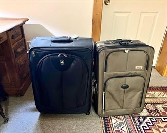 (2) Rolling Suitcases Atlantic And Delsev & (2) Luggage Racks
