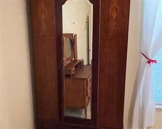 Beautiful antique armoire with shelving inside