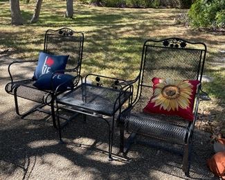 Beautiful outdoor wrought iron chairs and table