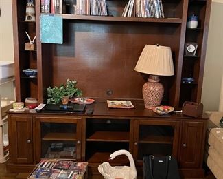 Beautiful wall unit, holds a HUGE tv