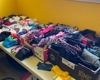 LuluLemon and Athleta Exercise wear … and Lots of it! Tops, shorts, pants.