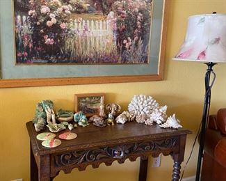Coral pieces, fun sculptures and a lovely vintage console table.